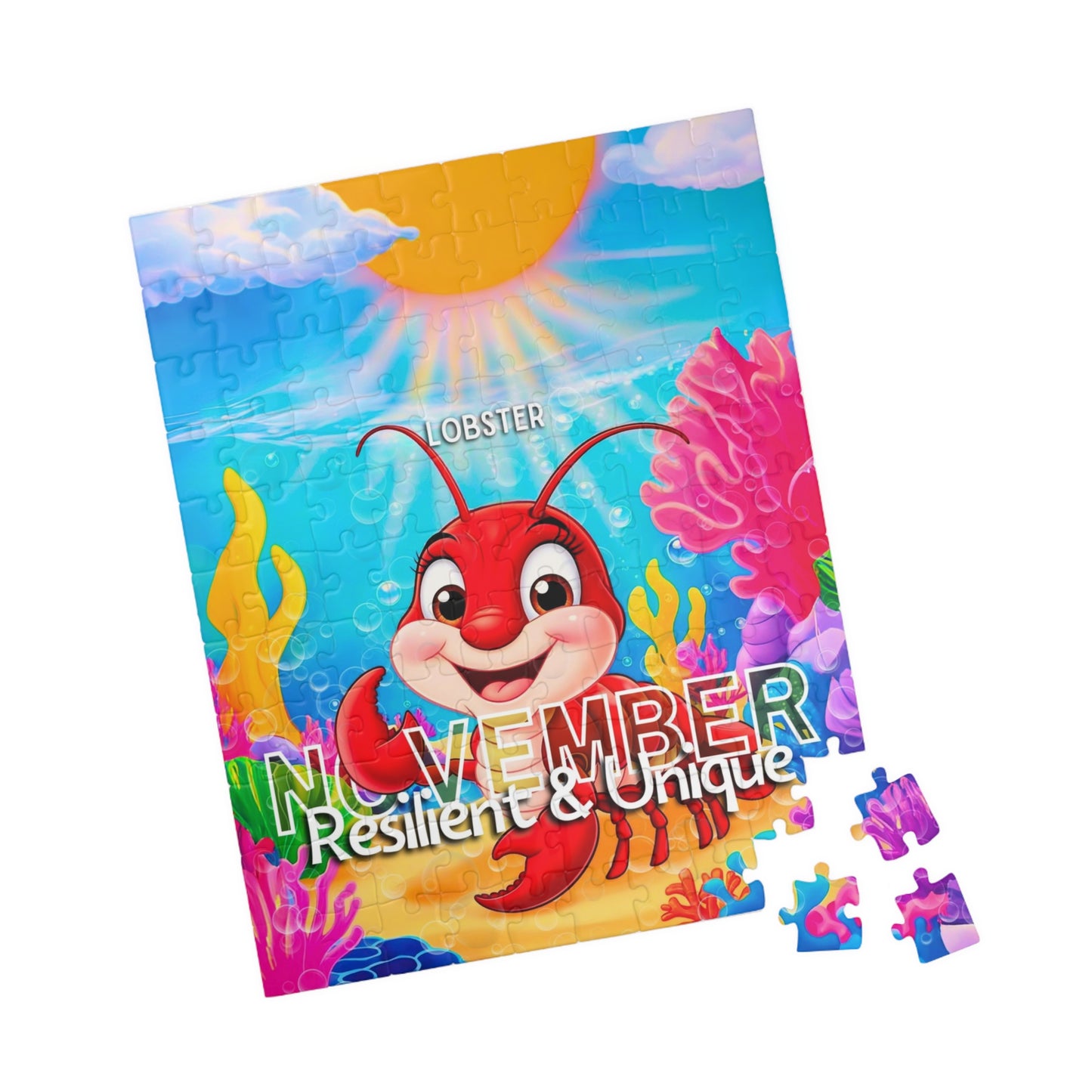 Kids birth month puzzle featuring a cheerful red lobster and colorful ocean scene for November