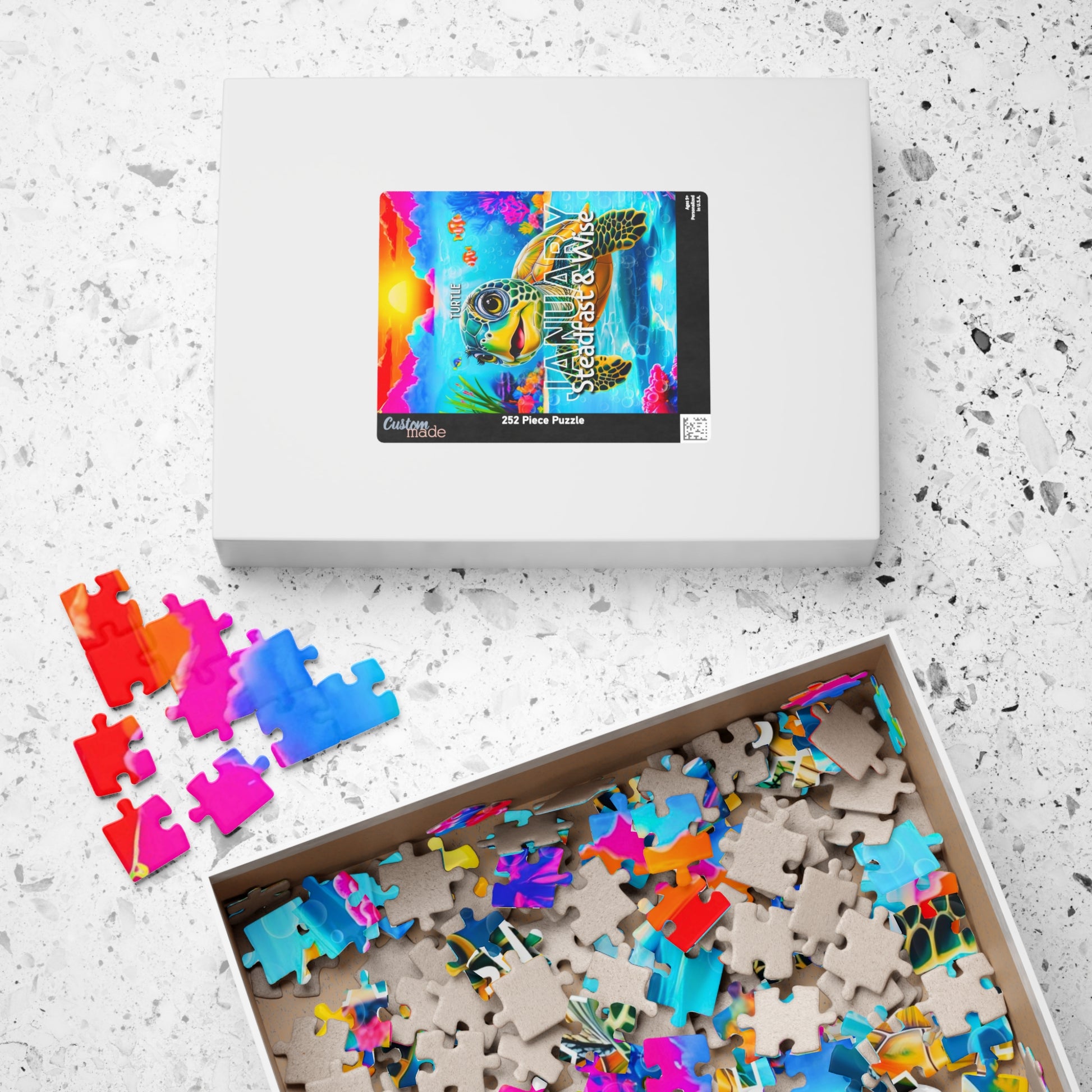 Kids birth month puzzle featuring colorful turtle design with vibrant ocean and sunset background