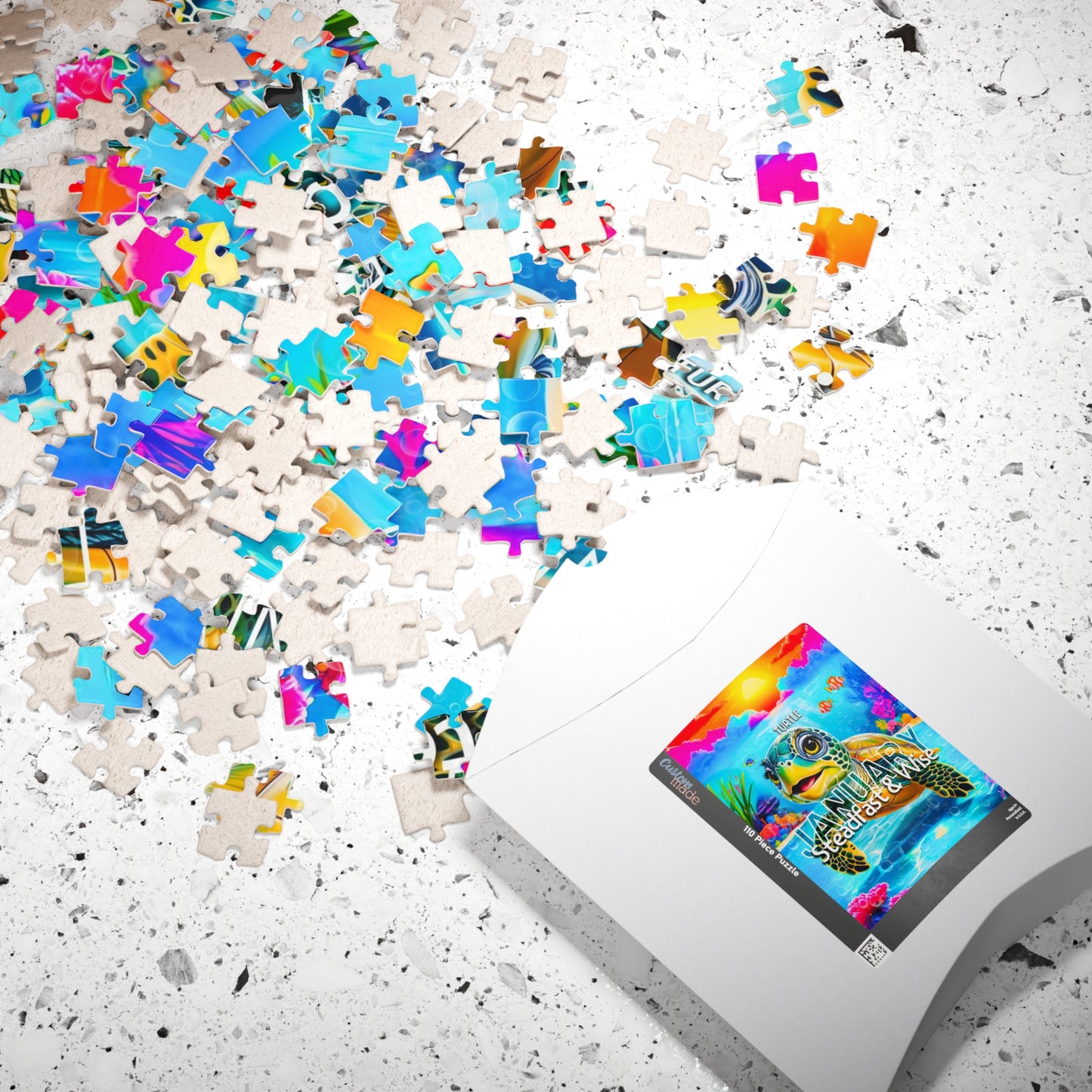 Scattered colorful puzzle pieces with a box featuring a kids birth month puzzle on a white surface