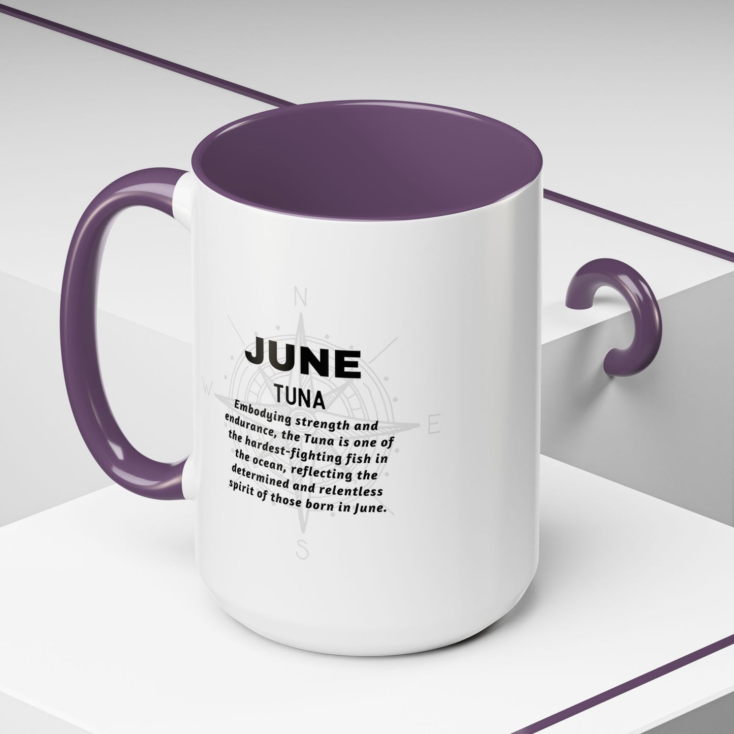 White birth month coffee mug with purple interior and handle featuring text about the month of June Tuna.
