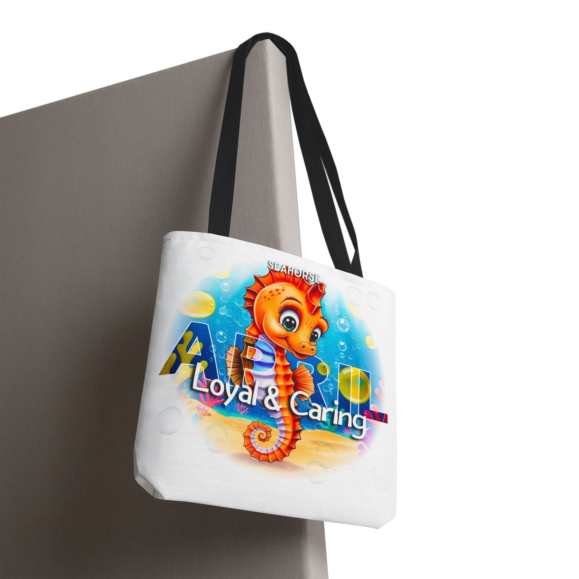 Kids birth month beach tote bag with colorful seahorse and loyal caring text design