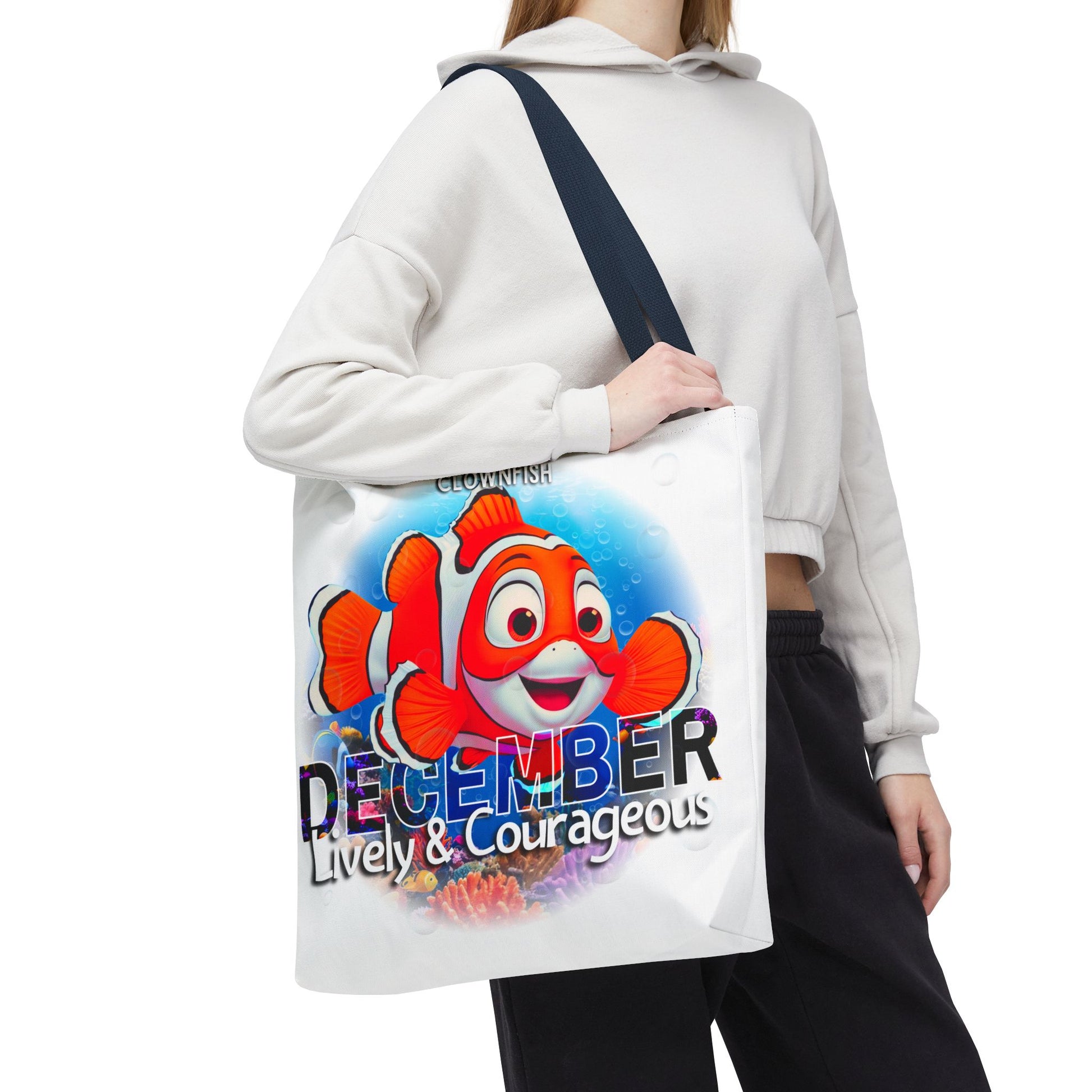 kids birth month beach tote bag with December lively and courageous clownfish design