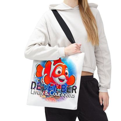 Kids birth month beach tote bag with colorful December clownfish design and black shoulder strap