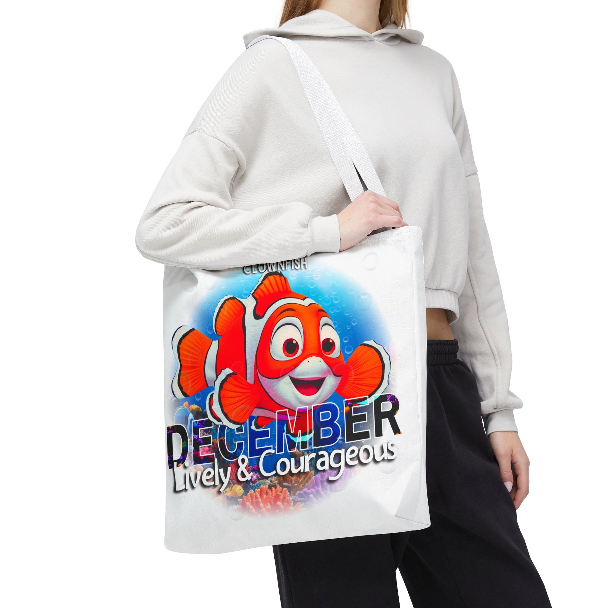 Kids birth month beach tote bag with lively December clownfish design
