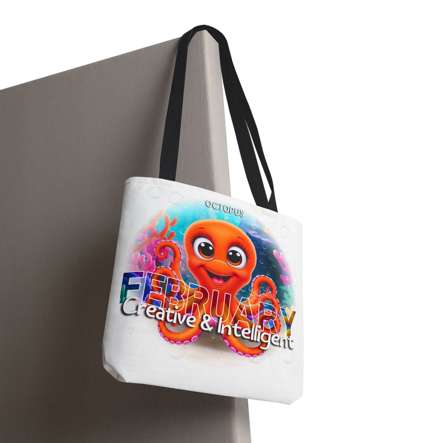 Kids birth month beach tote bag with colorful February octopus design and black handles
