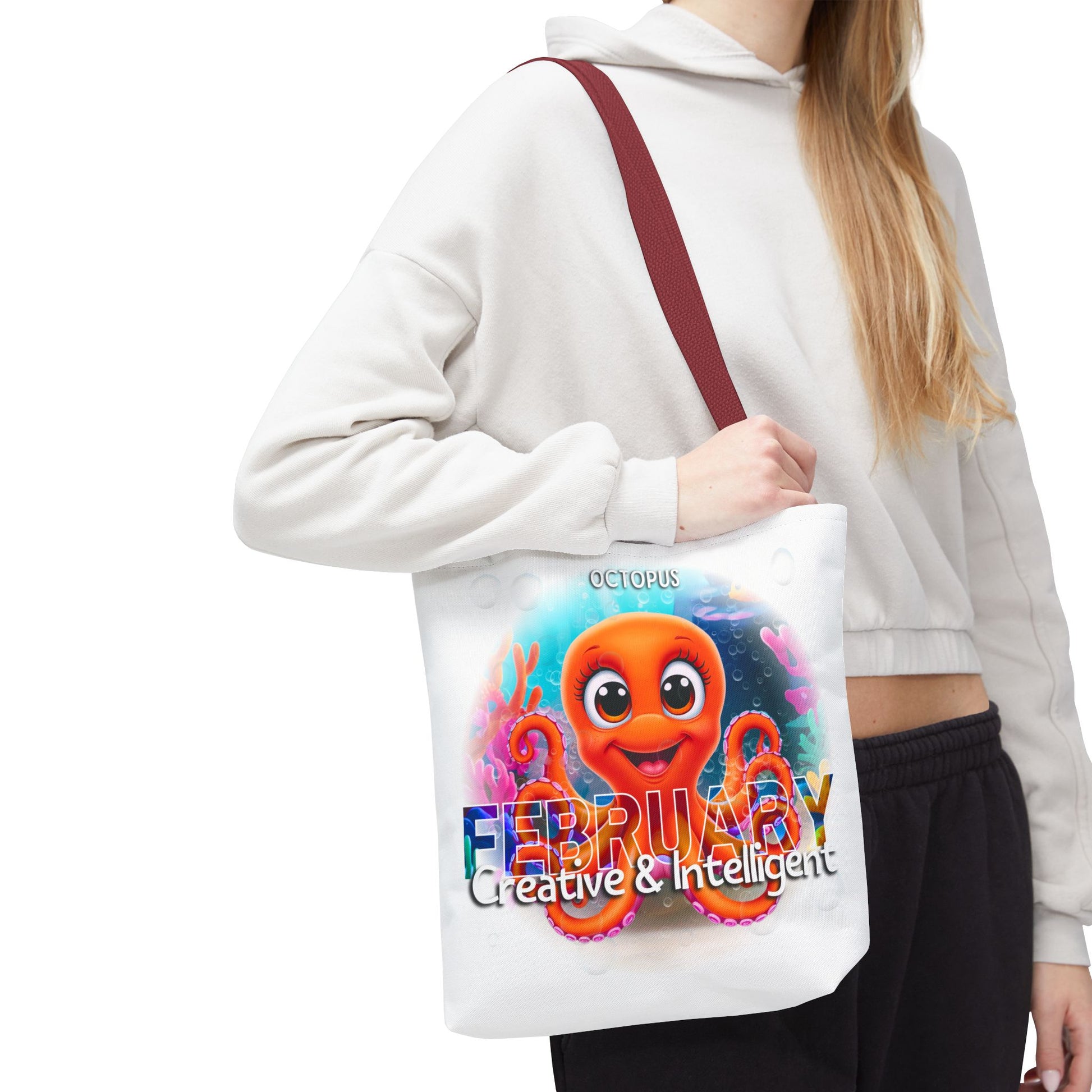 Kids birth month beach tote bag with colorful February octopus design and red strap
