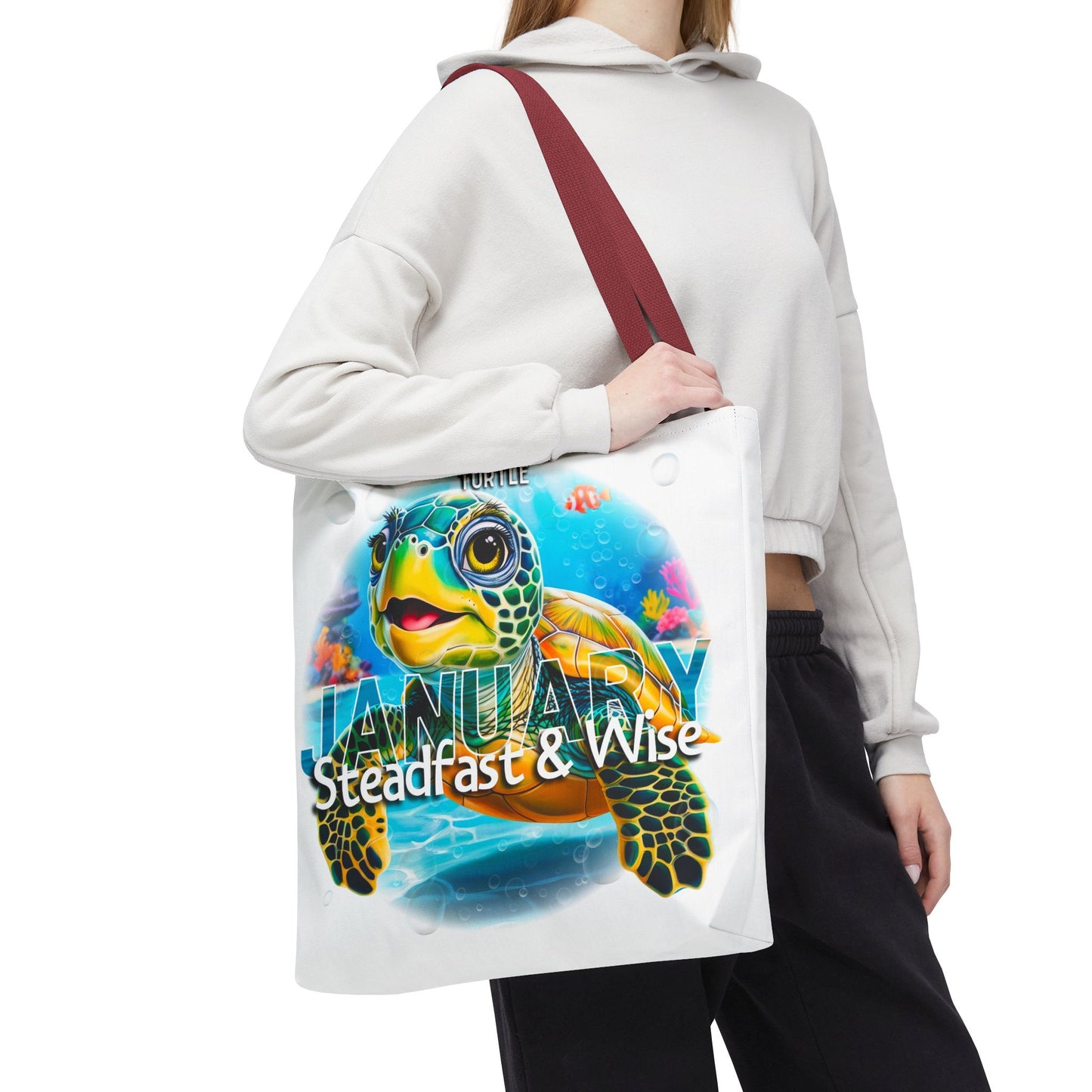 Kids birth month beach tote bag with colorful January turtle design and maroon strap