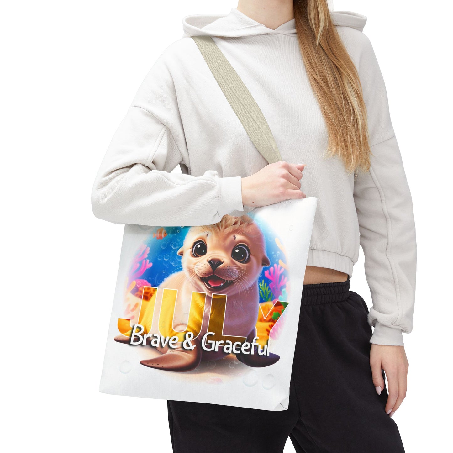 Kids birth month beach tote bag with July design featuring a cute sea otter and colorful underwater scene