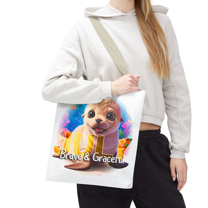 Kids birth month beach tote bag with July design featuring a cute sea otter and colorful underwater scene