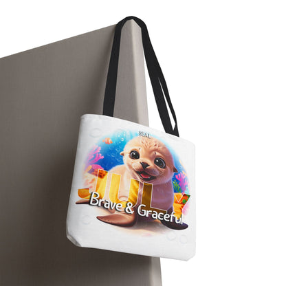 Kids birth month beach tote bag featuring a cute seal with Brave and Graceful text