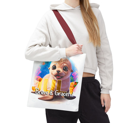 Kids birth month beach tote bag with July design featuring a cute sea otter and bright underwater colors