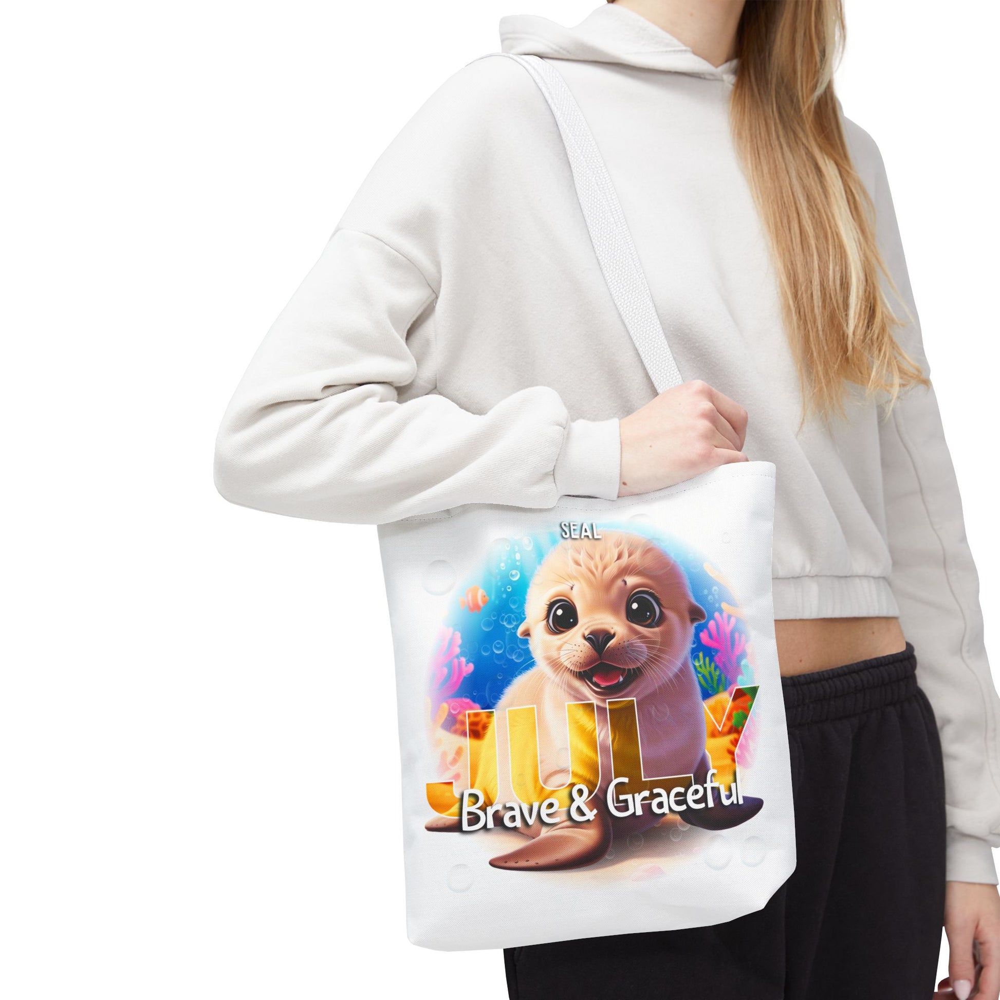 Kids birth month beach tote bag with cute sea lion design and July text