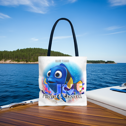 Kids birth month beach tote bag featuring playful blue tang fish and June design