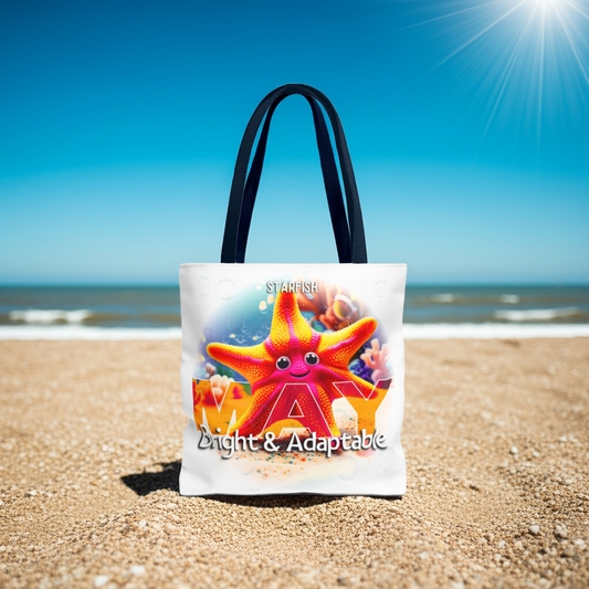 Kids birth month beach tote bag with colorful starfish design on sandy beach