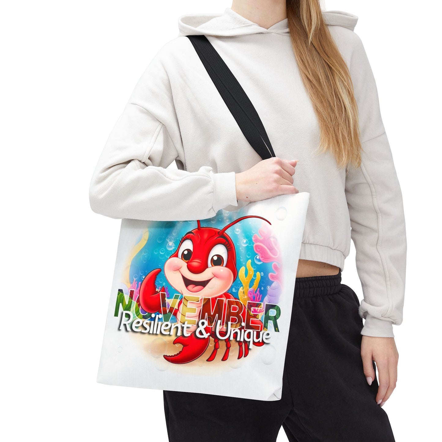 Kids birth month beach tote bag featuring November design with a red lobster and colorful underwater background