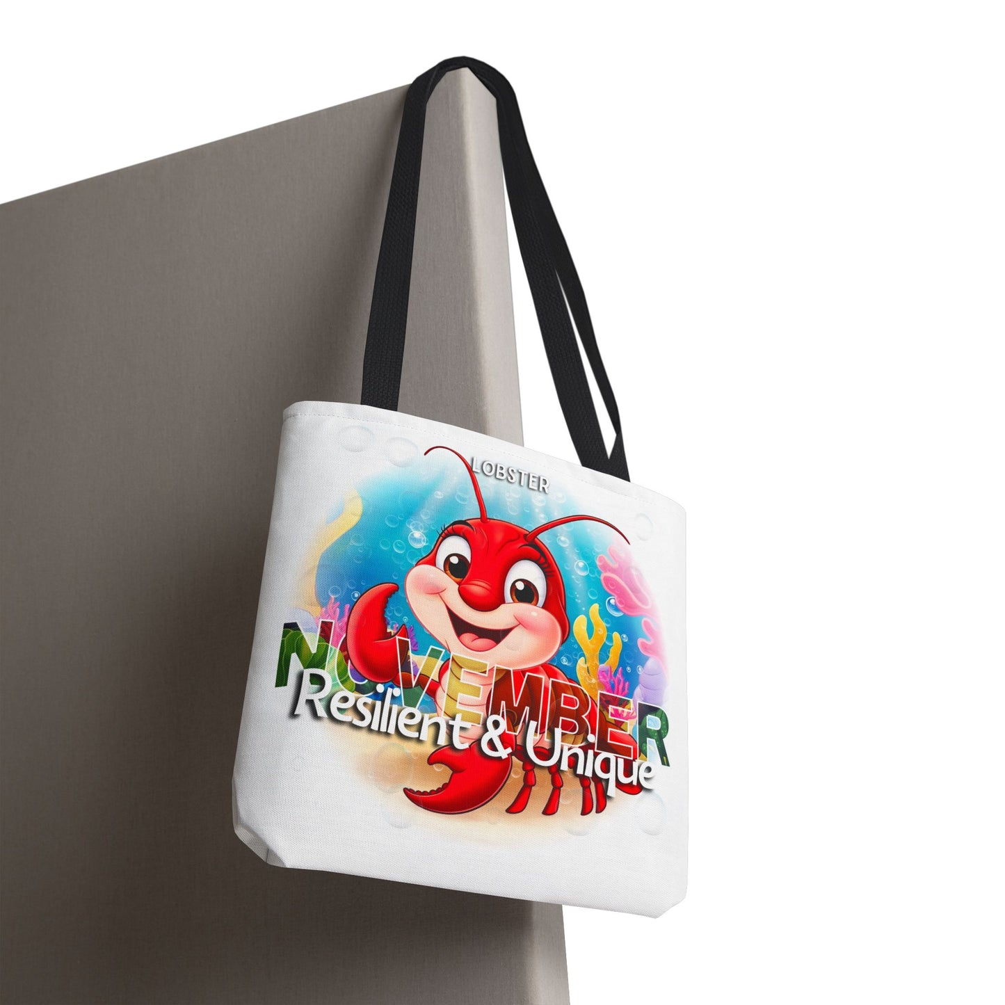 Kids birth month beach tote bag with November lobster design and unique colorful graphics