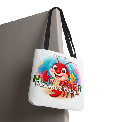 Kids birth month beach tote bag featuring November design with a red lobster and colorful underwater theme