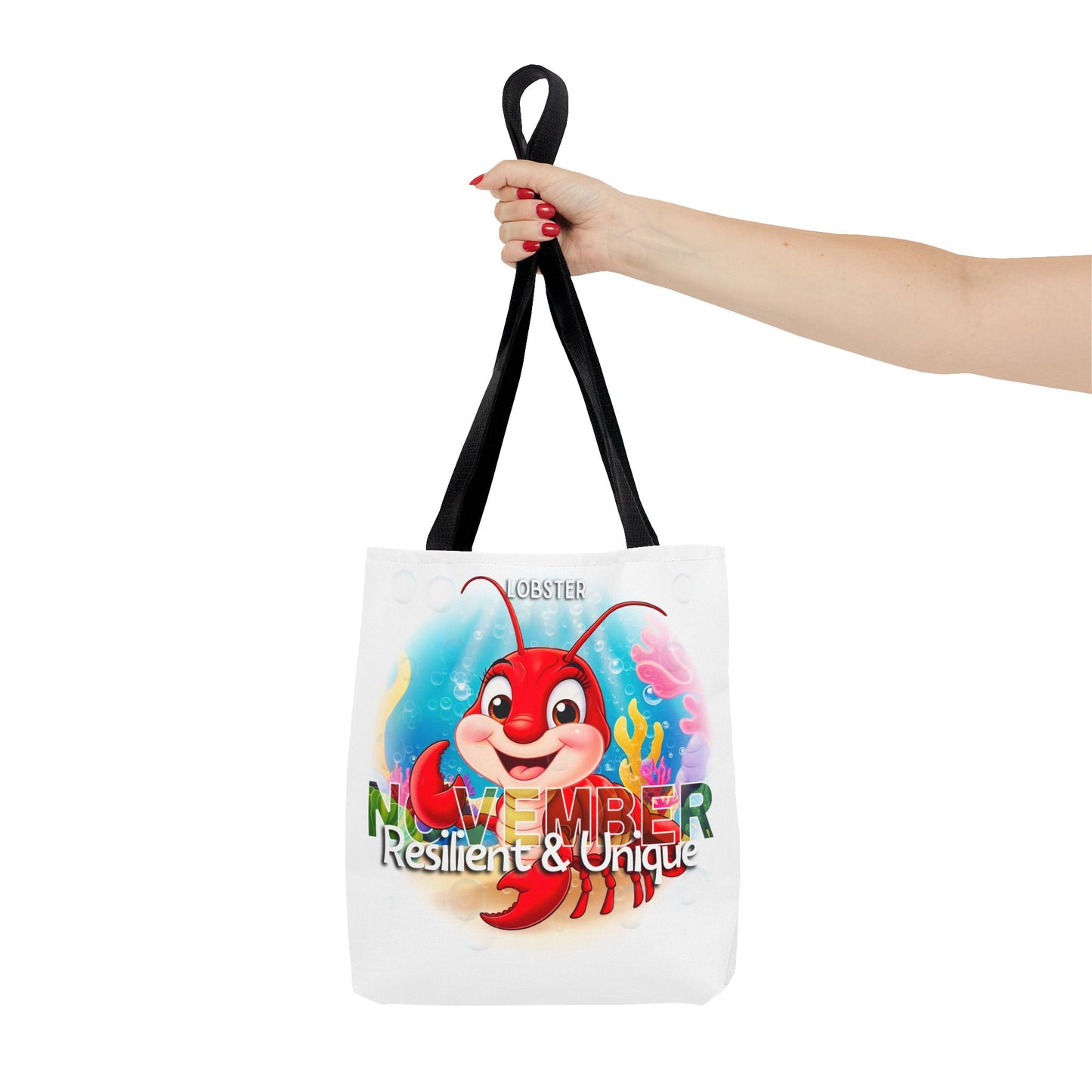 Kids birth month beach tote bag with colorful lobster November design and black handles