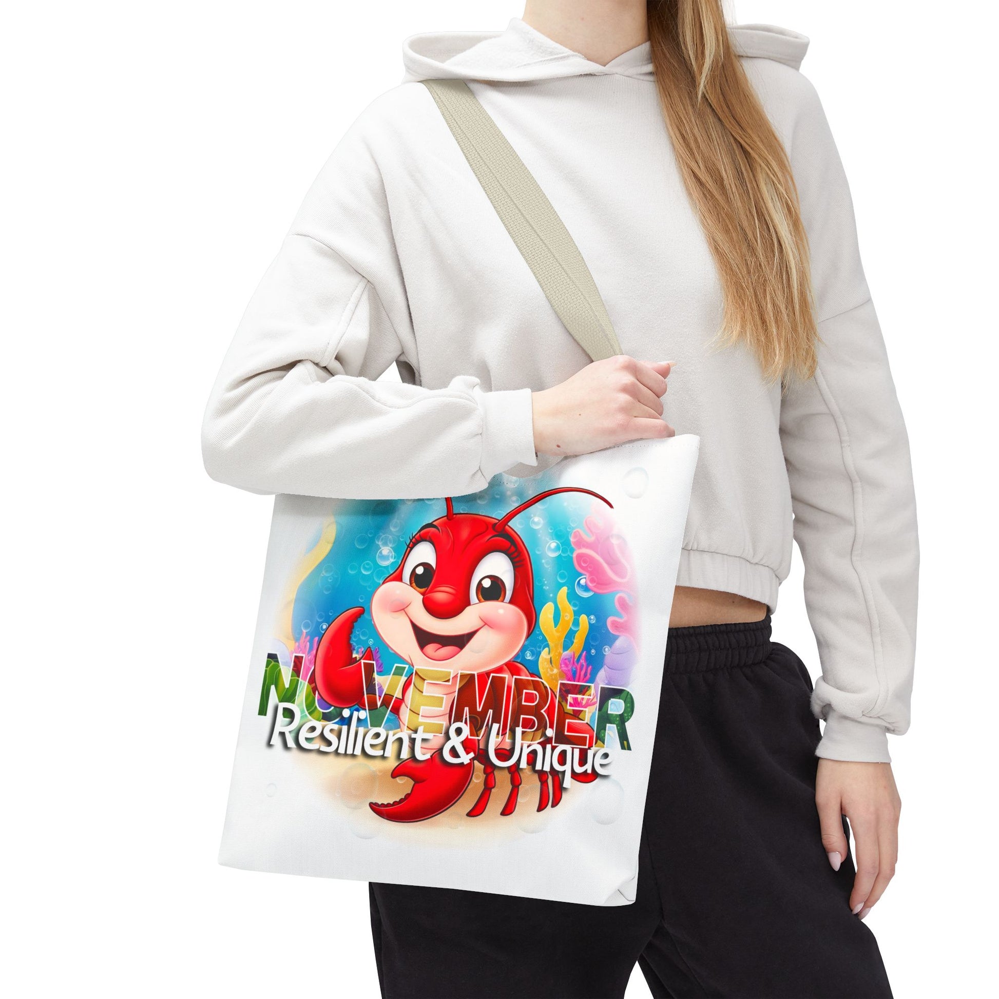Kids birth month beach tote bag with colorful November lobster design and resilient unique text