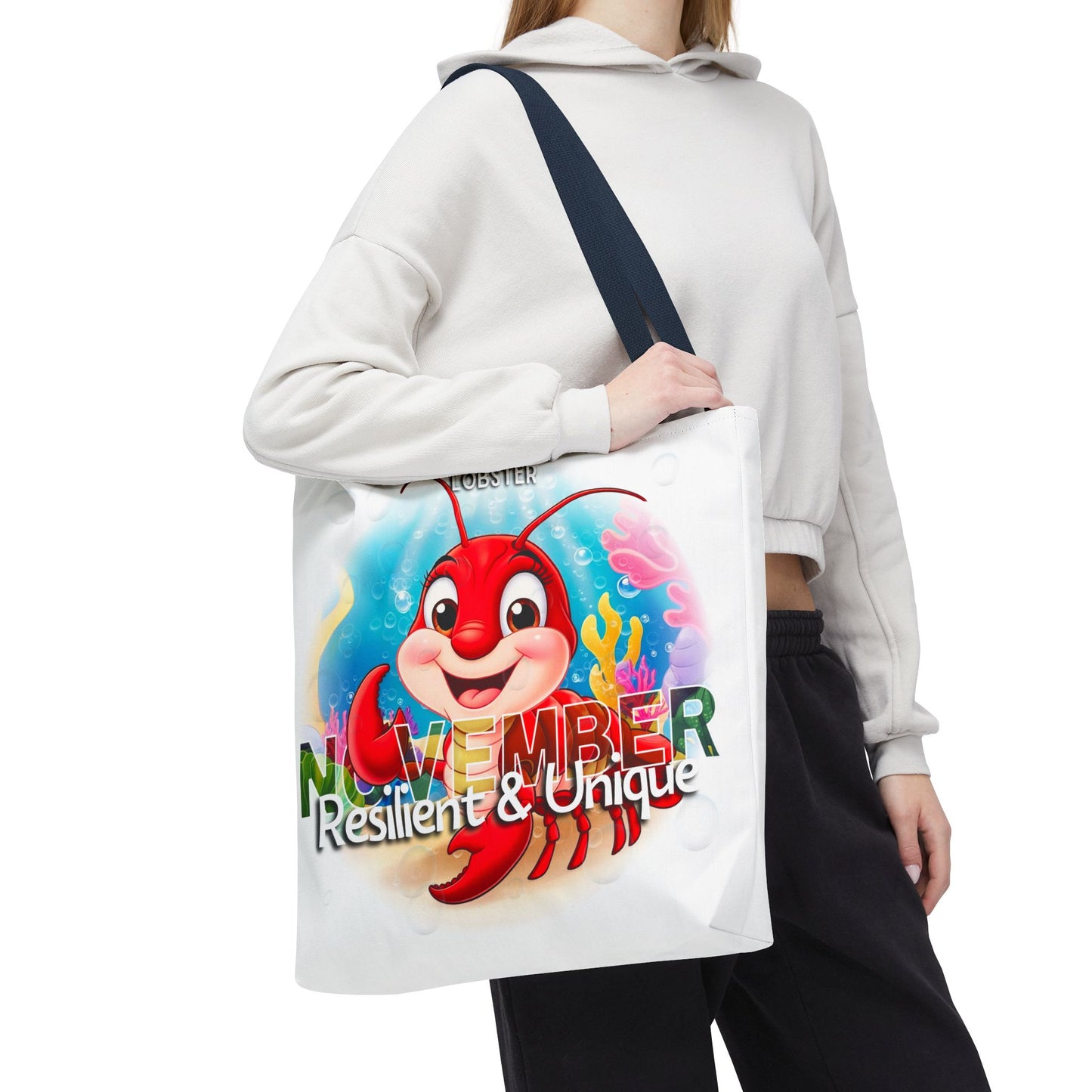 Kids birth month beach tote bag with November design featuring a red lobster and colorful underwater scene
