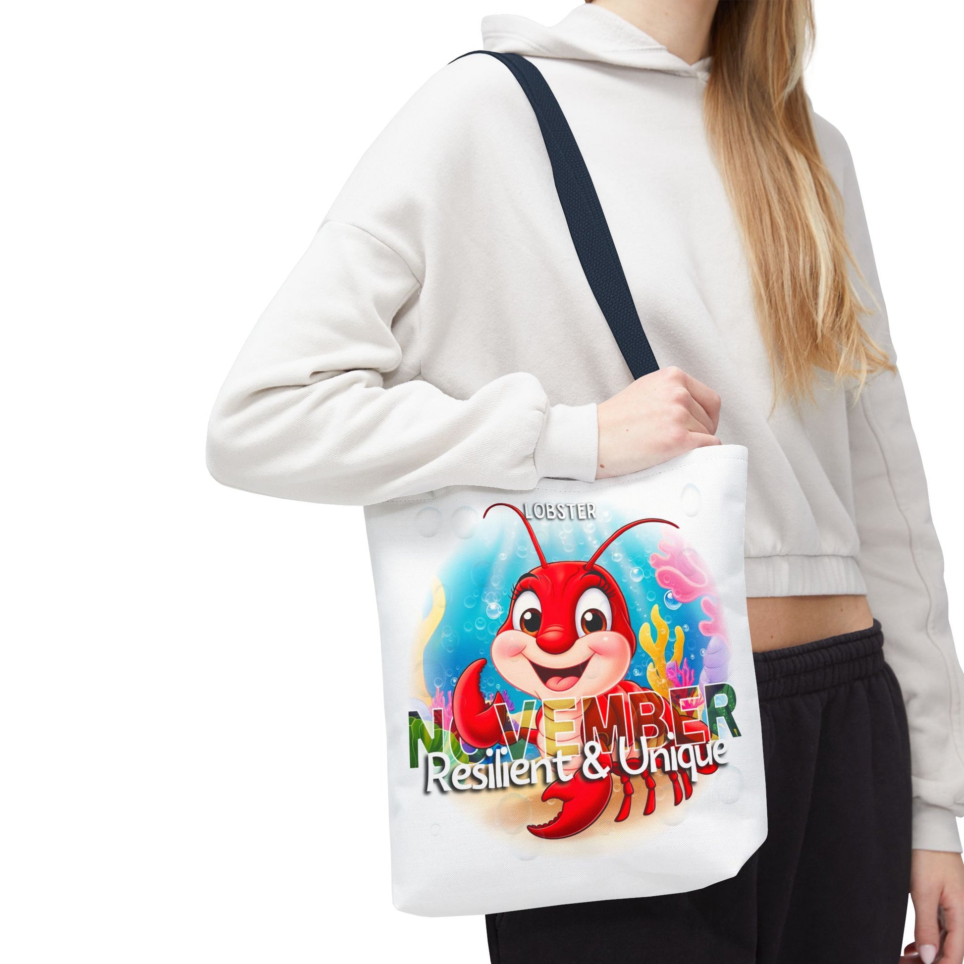 Kids birth month beach tote bag November with colorful lobster design and black strap