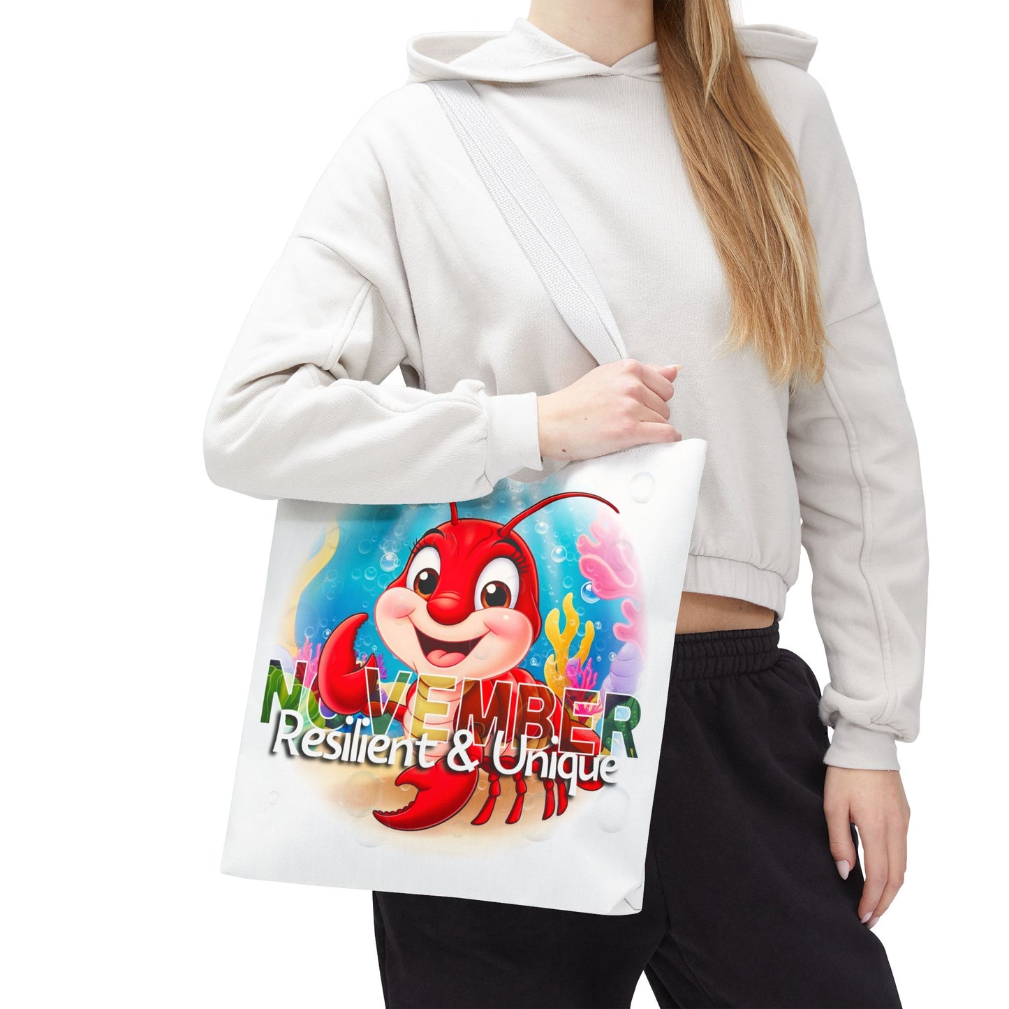 Kids birth month beach tote bag with colorful November lobster design and text