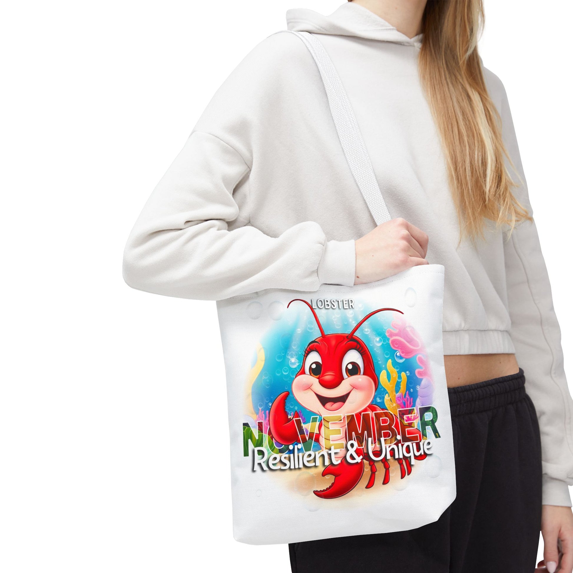 Kids birth month beach tote bag featuring November lobster design with colorful underwater artwork