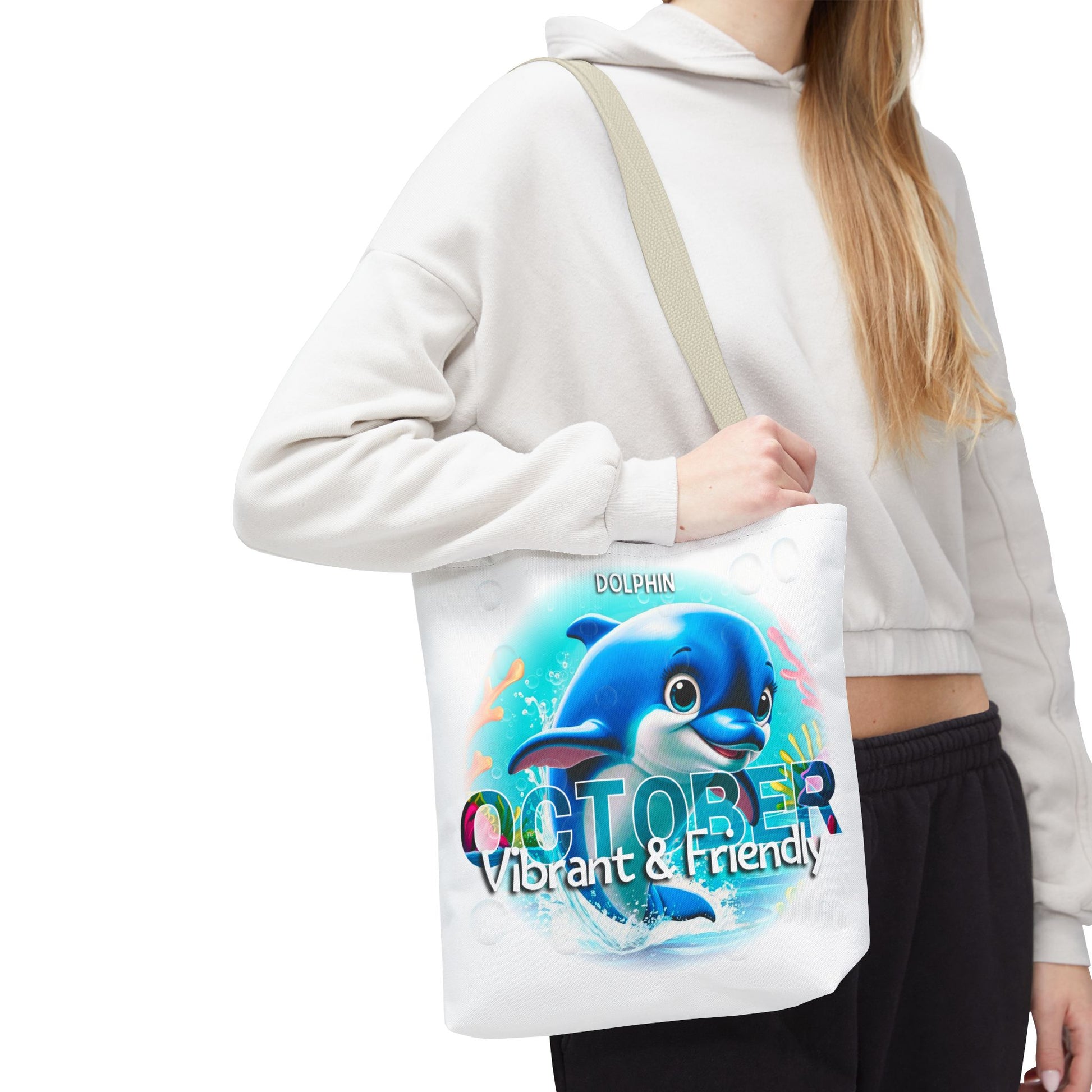 Kids birth month beach tote bag featuring vibrant dolphin design for October