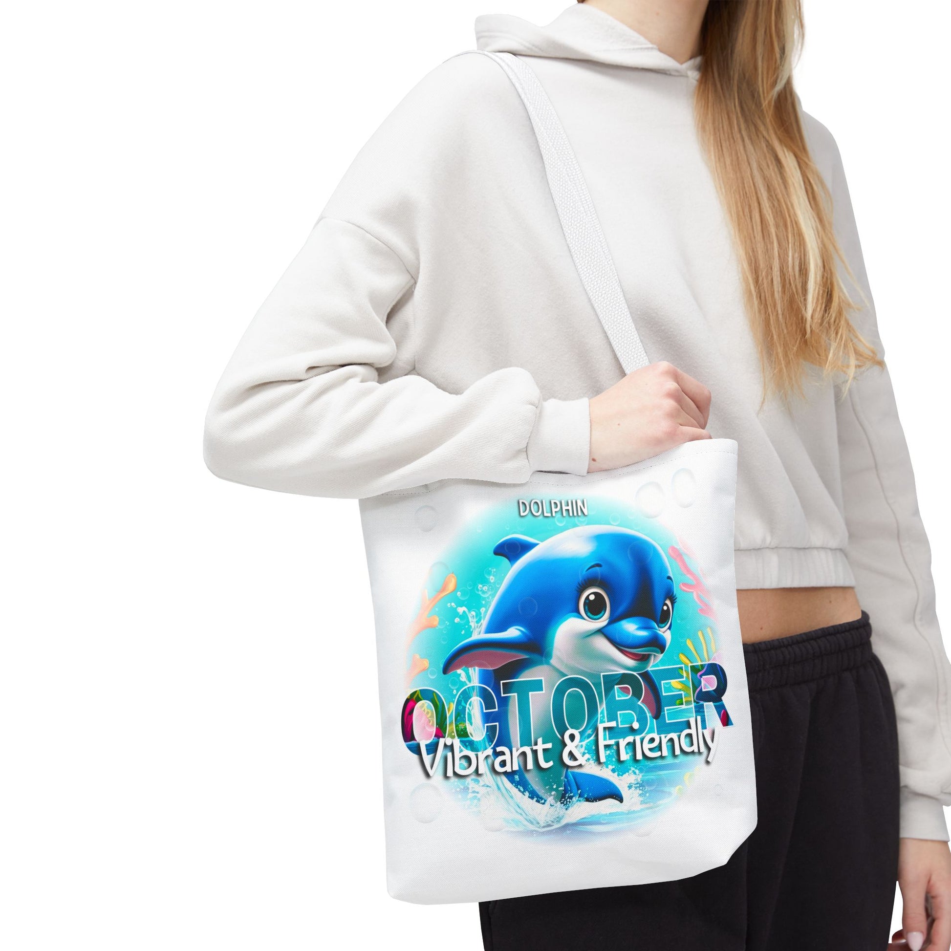 Kids birth month beach tote bag with vibrant blue dolphin and October text