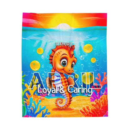 Colorful kids birth month blanket featuring a seahorse with April text and loyal caring traits