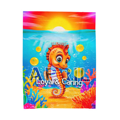 Colorful kids birth month blanket featuring a seahorse for April with loyal and caring text