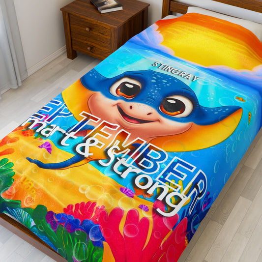 Kids birth month blanket with colorful October stingray design and cheerful underwater theme