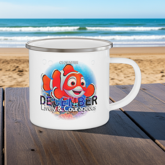 Kids birth month camping mug with December clownfish design on white enamel mug at the beach