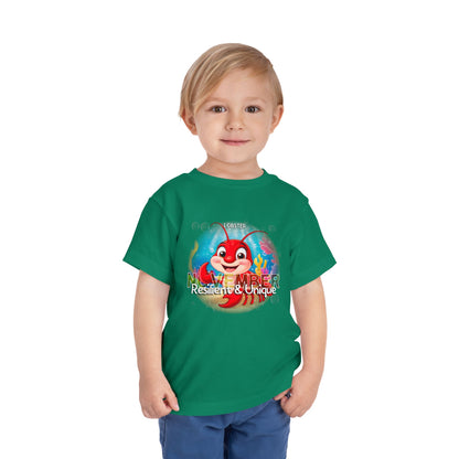 Green kids birth month tshirt featuring a red lobster cartoon and November text worn by a smiling toddler