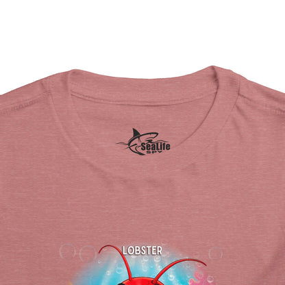Kids birth month tshirt in pink featuring a lobster graphic for children