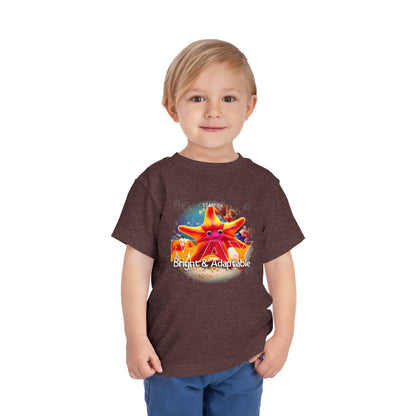 Child wearing a kids birth month tshirt with colorful starfish design and bright adaptable text