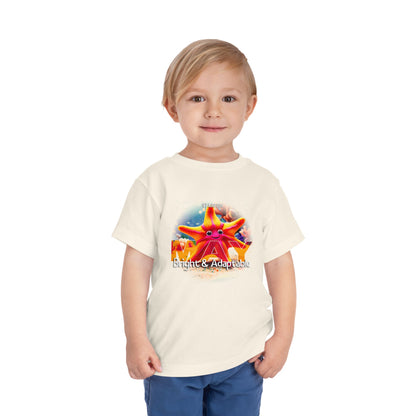 Toddler wearing a kids birth month tshirt with a bright starfish design and adaptable theme