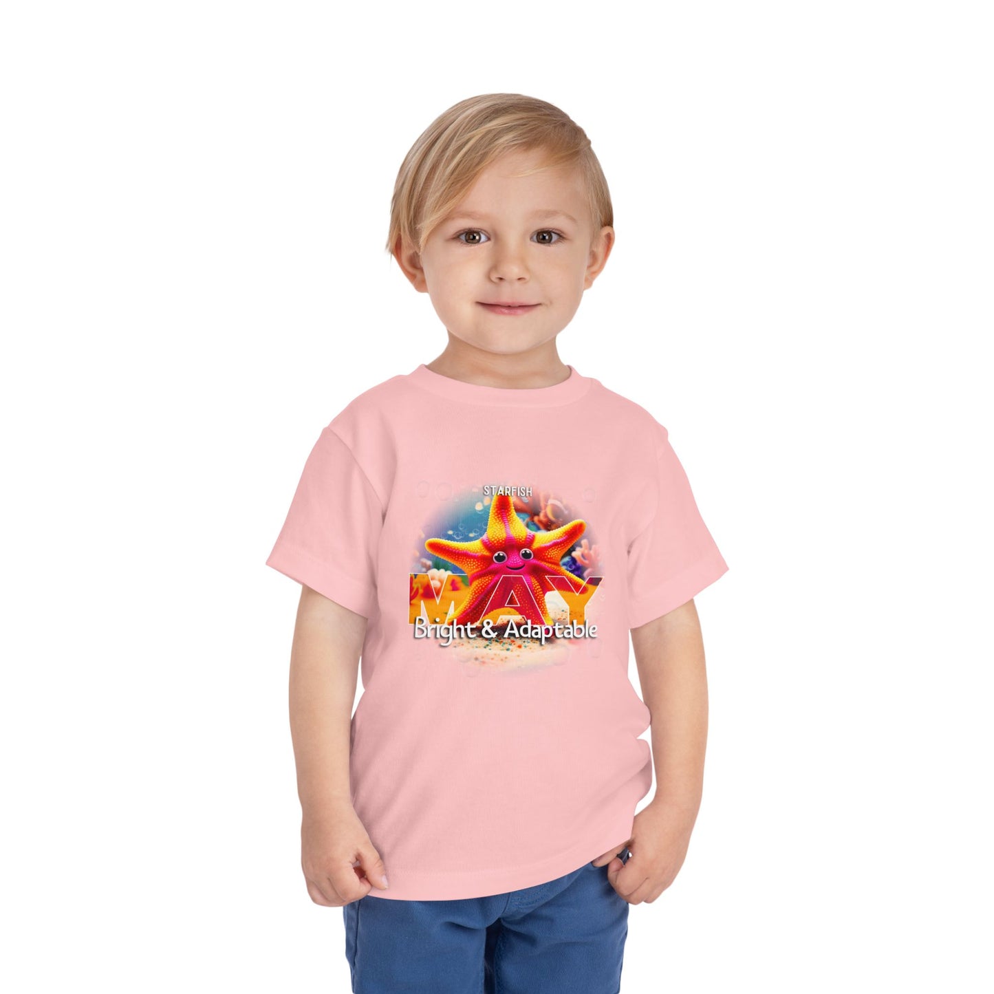 Toddler wearing a pink kids birth month tshirt with a colorful starfish design for May