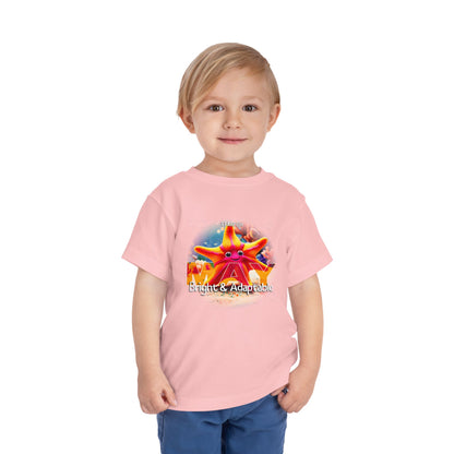 Toddler wearing a pink kids birth month tshirt with a colorful starfish design for May