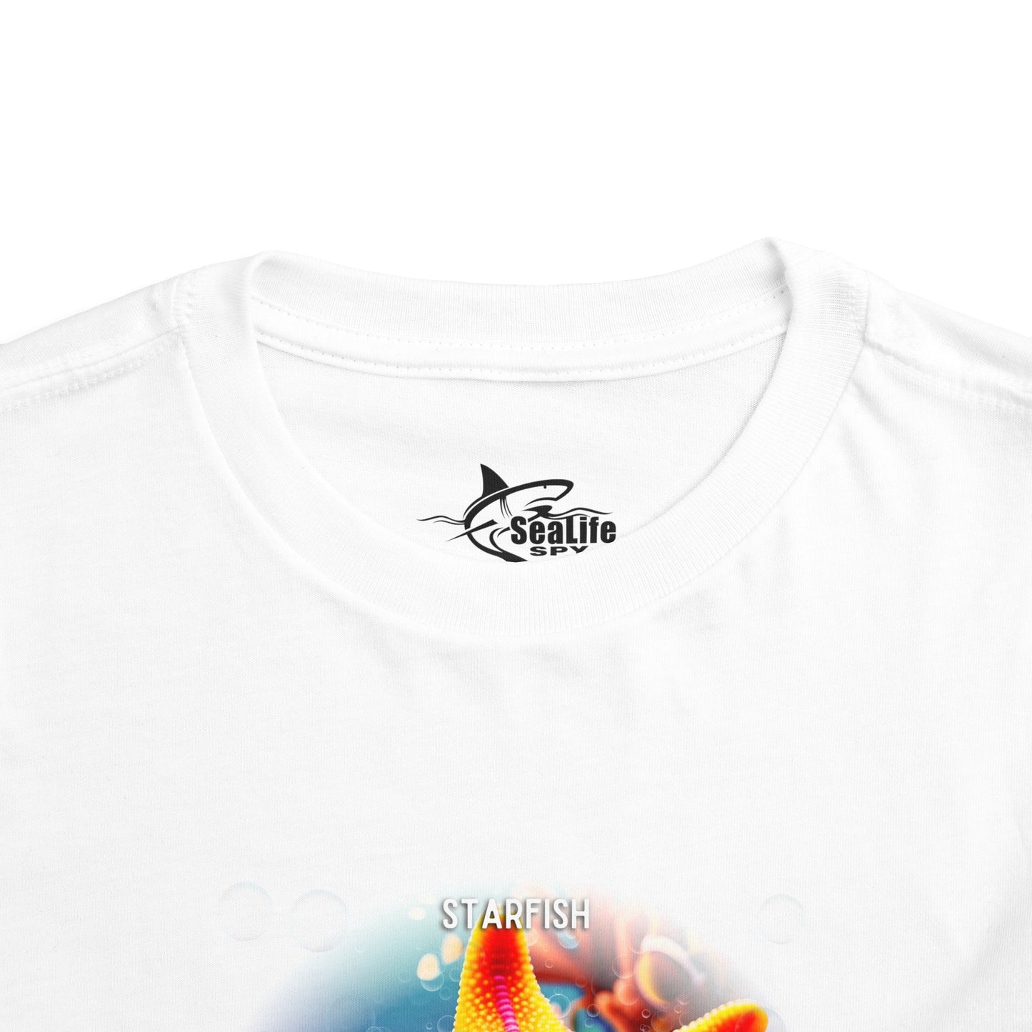 White kids birth month tshirt featuring colorful starfish design 