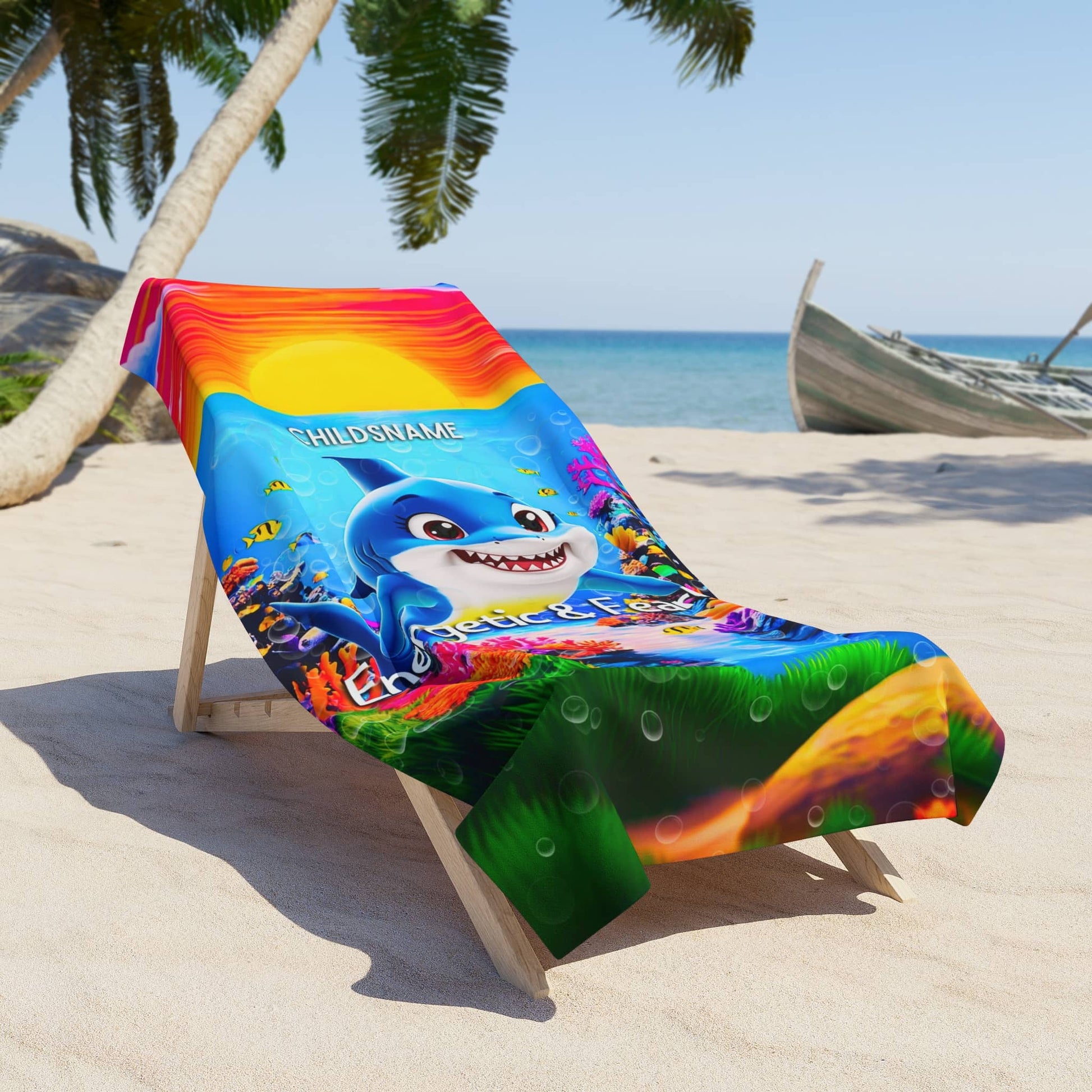 Colorful kids beach towel with a cartoon shark design on a beach chair, set against a tropical backdrop.