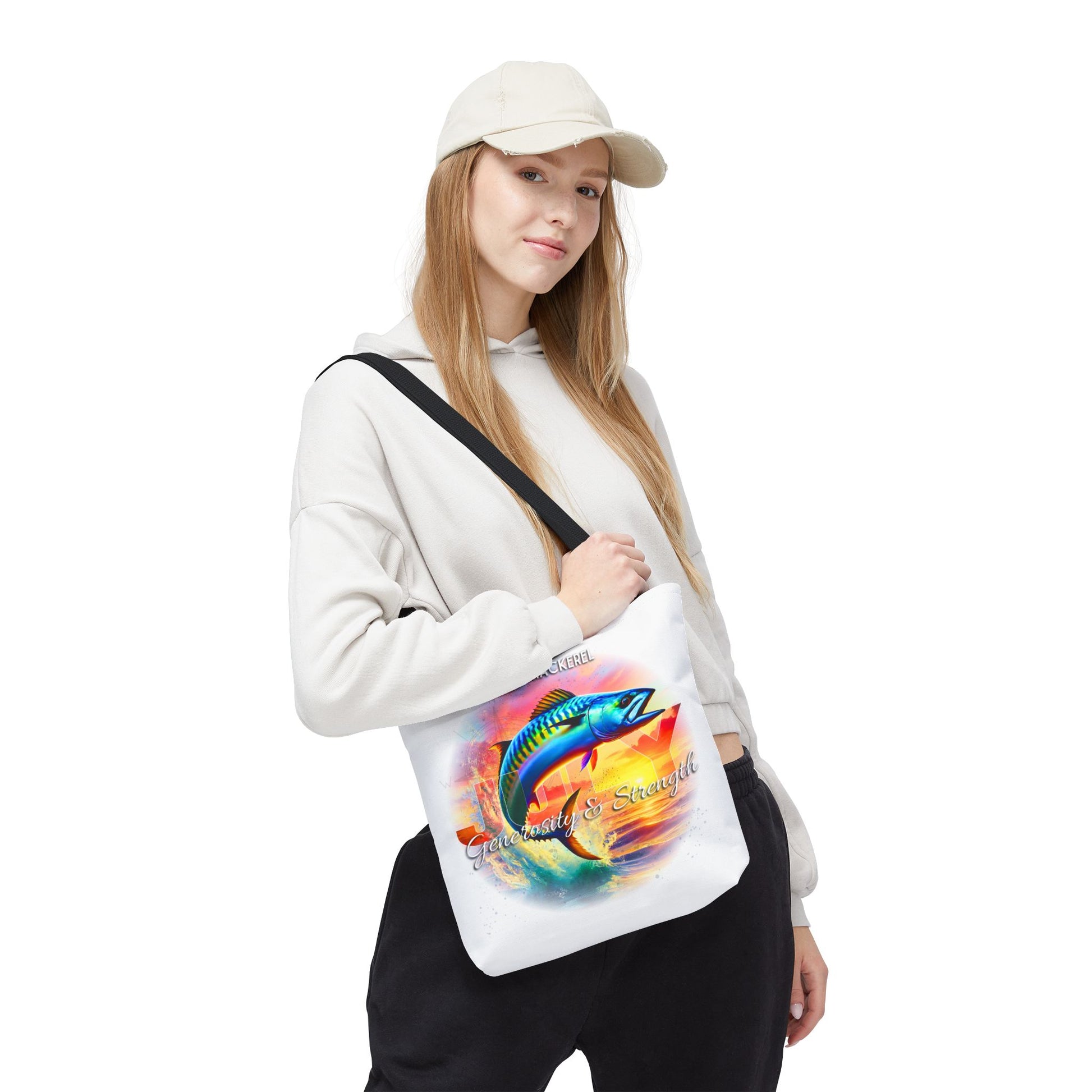 Woman wearing a birth month beach tote with colorful fish design and adjustable black strap