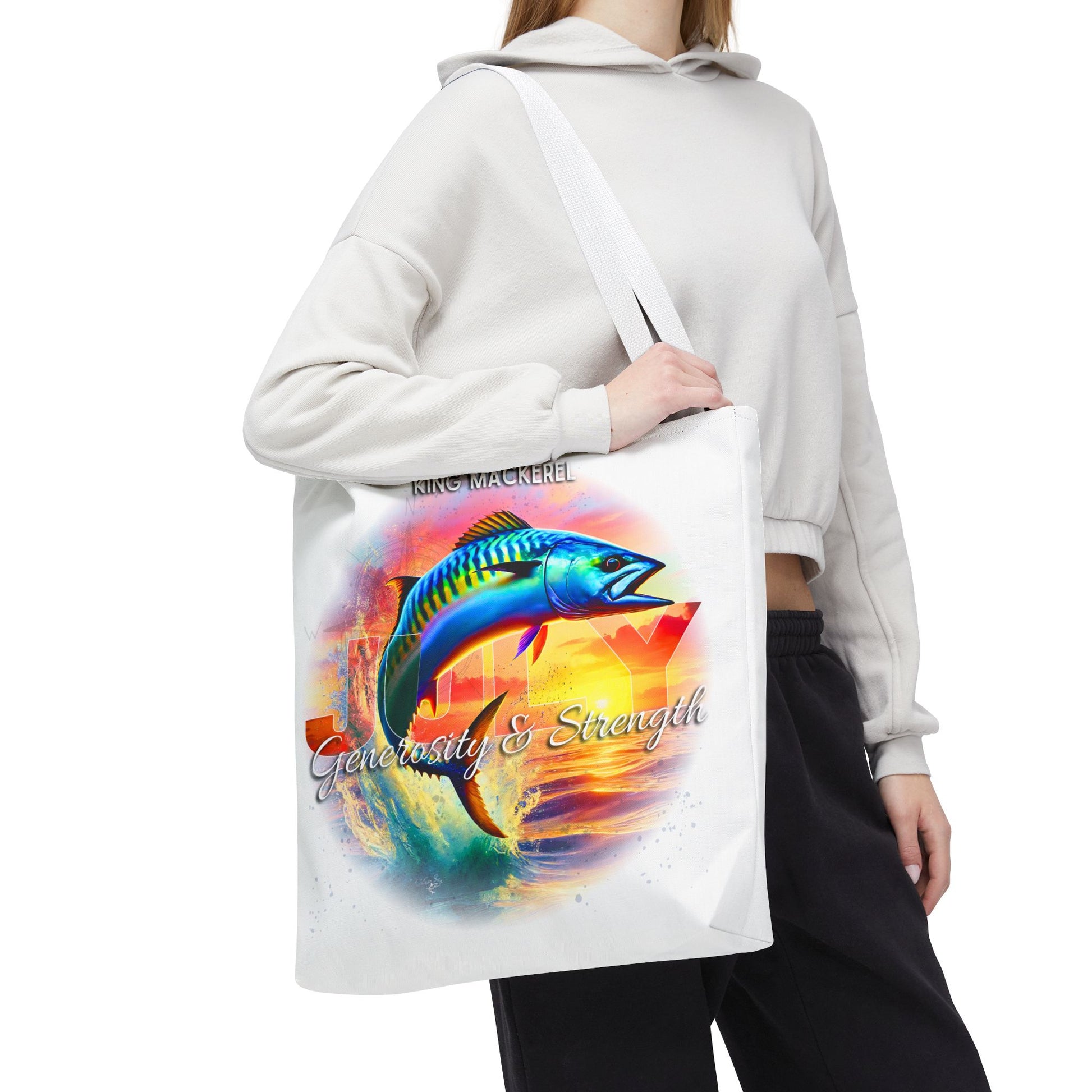 Birth month beach tote with colorful king mackerel design and Generosity & Strength text