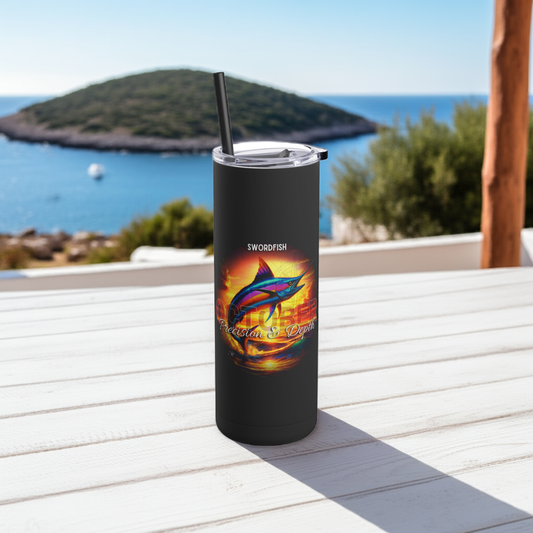 Black birth month travel tumbler with colorful swordfish design on white wooden table by the sea