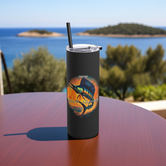 Black birth month travel tumbler with sailfish design on wooden table overlooking ocean view