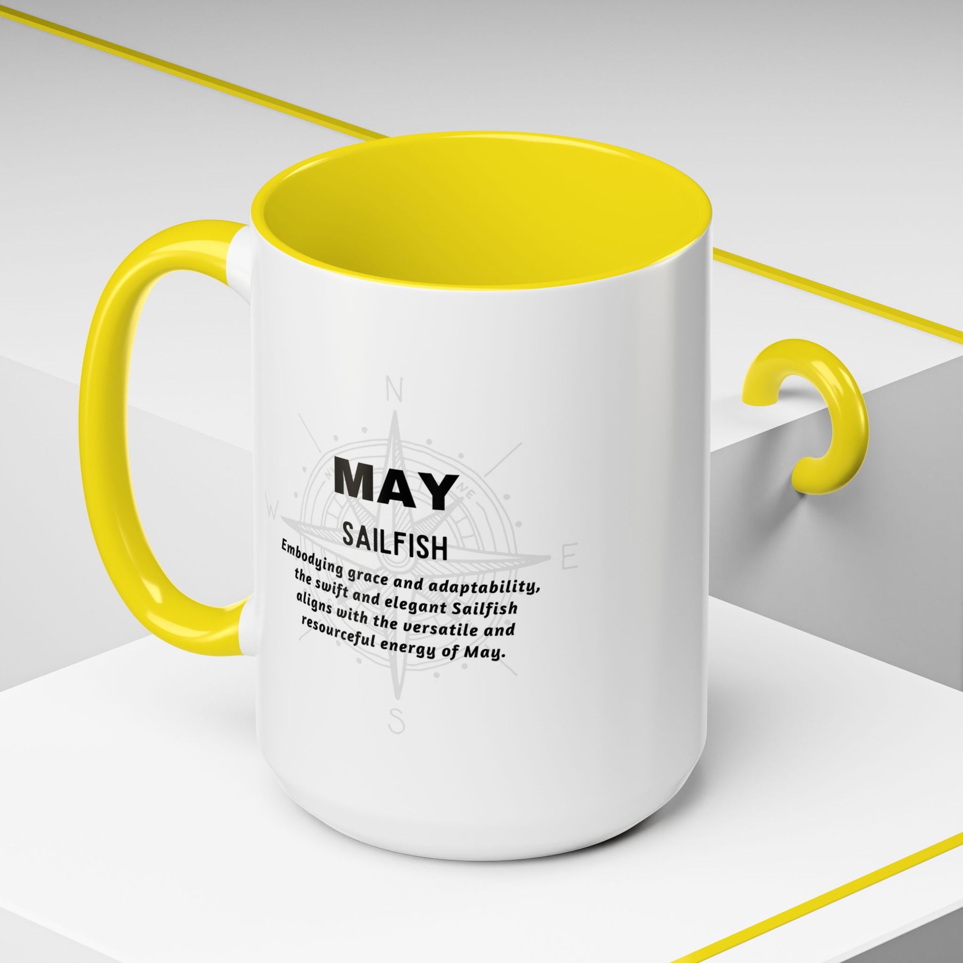 May Sailfish white coffee mug with yellow interior and handle featuring text about May Sailfish on a white background