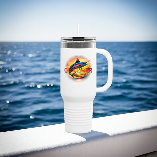 White birth month travel mug featuring colorful marlin fish design on ocean background