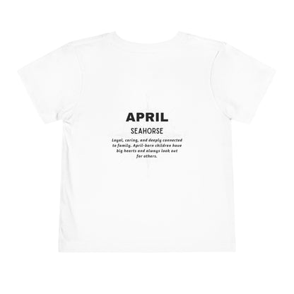 White kids birth month tshirt with April Seahorse design and description 