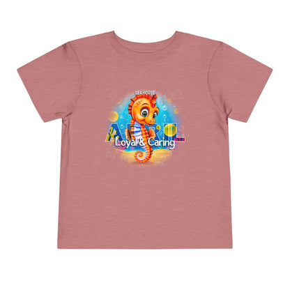 Kids birth month tshirt featuring a colorful seahorse design with Loyal and Caring text