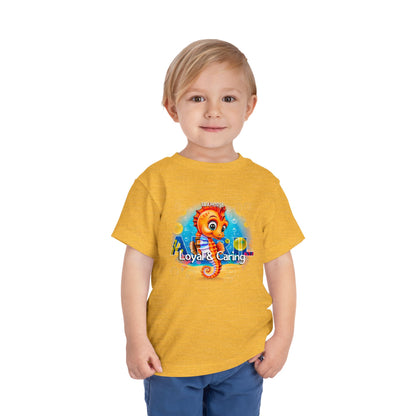 Toddler wearing yellow kids birth month tshirt with a colorful seahorse design 